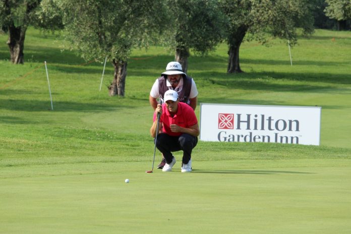 Martin Kaymer with his caddie